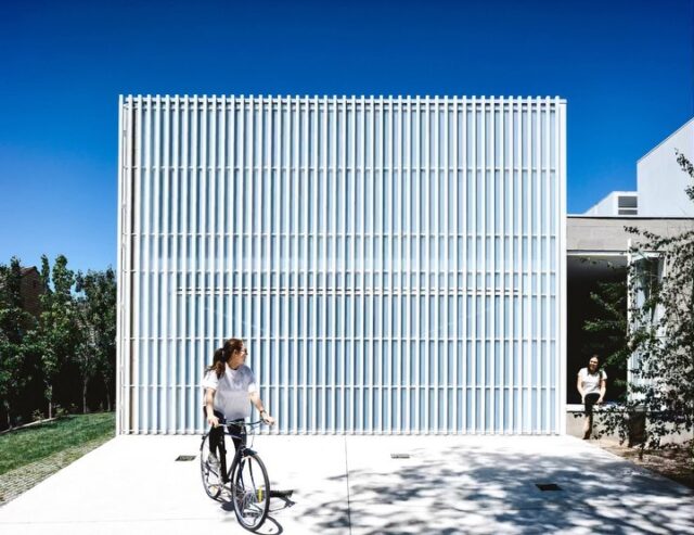 From the #EATArchives 
Moving House was a project finished around 2017 that was about balancing privacy and access to light. The aluminum screen appears to the street as a monolithic object but once inside, the secret views to the garden, the sky and the variation in ceiling shape and height creates highly dynamic moments of sun and shadow. You can almost track time as light dances across the floorplate. Maybe that is why we called it moving house? Something is always on the go. 
.
Photos @derek_swalwell